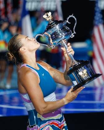 Melbourne, Australia 28th Jan , 2023 Winner Aryna Sabalenka holding the trophy of the Australian Open 2023 tournament at Melbourne Park on Saturday 28 January 202 Â Copyright: xJuergenxHasenkopfx