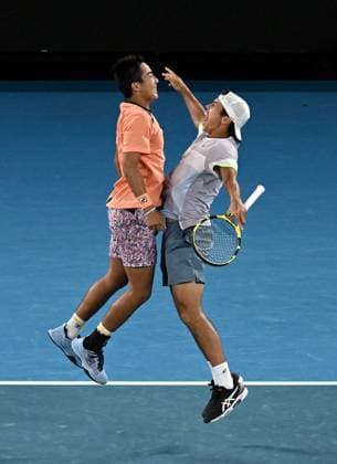 TENNIS AUSTRALIAN OPEN, Australian?s Rinky Hijikata (left) and Jason Kubler celebrate winning the men?s doubles final against Hugo Nys of Monaco and Jan Zielinski of Poland at the 2023 Australian Open tennis championship at Melbourne Park in Melbourne, Saturday, January 28, 2023. ( NO ARCHIVING, EDITORIAL USE ONLY, NO USE IN BOOKS WITHOUT CONSENT MELBOURNE VICTORIA AUSTRALIA  Copyright: xLUKASxCOCHx 20230129001757542657