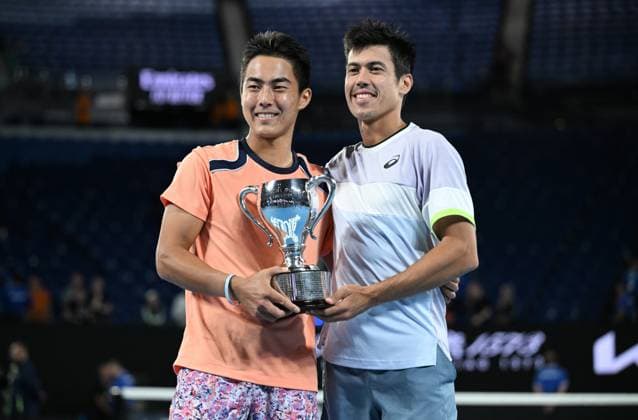 TENNIS AUSTRALIAN OPEN, Australian?s Rinky Hijikata (left) and Jason Kubler pose for photographs after winning the men?s doubles final against Hugo Nys of Monaco and Jan Zielinski of Poland at the 2023 Australian Open tennis championship at Melbourne Park in Melbourne, Saturday, January 28, 2023. ( NO ARCHIVING, EDITORIAL USE ONLY, NO USE IN BOOKS WITHOUT CONSENT MELBOURNE VICTORIA AUSTRALIA  Copyright: xJamesxRossx 20230129001757544842
