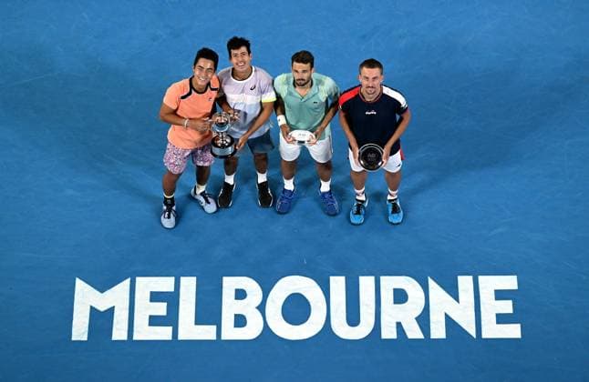 TENNIS AUSTRALIAN OPEN, L-R: Australia?s Rinky Hijikata, Jason Kubler and Hugo Nys of Monaco and Jan Zielinski of Poland pose for photographs following the men?s doubles final against at the 2023 Australian Open tennis championship at Melbourne Park in Melbourne, Saturday, January 28, 2023. ( NO ARCHIVING, EDITORIAL USE ONLY, NO USE IN BOOKS WITHOUT CONSENT MELBOURNE VICTORIA AUSTRALIA  Copyright: xLUKASxCOCHx 20230129001757549441
