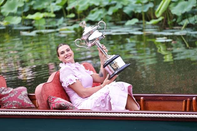 Aryna Sabalenka, BLR, presenting her trophy during a photoshoot in the botanical gardens after 2023 Australian Open in Melbourne, 29 01 2023