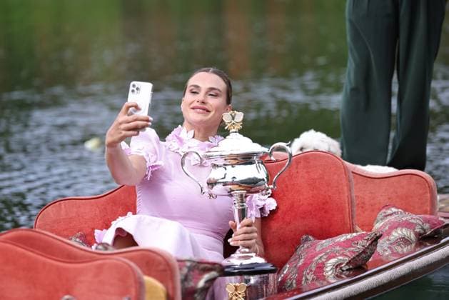 Aryna Sabalenka, BLR, presenting her trophy during a photoshoot in the botanical gardens after 2023 Australian Open in Melbourne, 29 01 2023