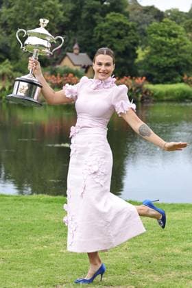 Aryna Sabalenka, BLR, presenting her trophy during a photoshoot in the botanical gardens after 2023 Australian Open in Melbourne, 29 01 2023