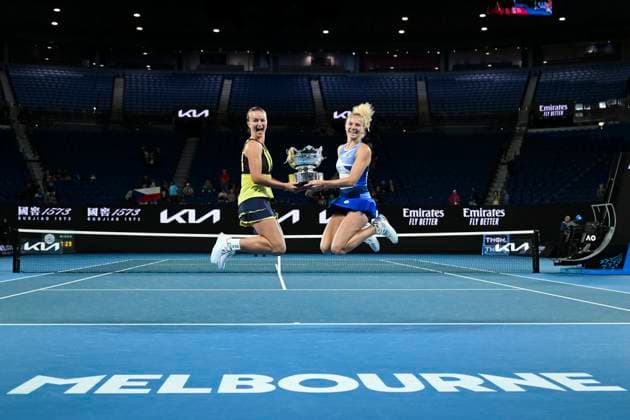 TENNIS AUSTRALIAN OPEN, Barbora Krejcikova and Katerina Siniakova of the Czech Republic pose for photographs with the trophy after winning their Women?s doubles final match against Shuko Aoyama and Ena Shibahara of Japan at the 2023 Australian Open tennis tournament at Melbourne Park in Melbourne, Sunday, January 29, 2023. ( NO ARCHIVING, EDITORIAL USE ONLY, NO USE IN BOOKS WITHOUT CONSENT MELBOURNE VICTORIA AUSTRALIA  Copyright: xLUKASxCOCHx 20230129001757852388