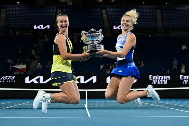 TENNIS AUSTRALIAN OPEN, Barbora Krejcikova and Katerina Siniakova of the Czech Republic pose for photographs with the trophy after winning their Women?s doubles final match against Shuko Aoyama and Ena Shibahara of Japan at the 2023 Australian Open tennis tournament at Melbourne Park in Melbourne, Sunday, January 29, 2023. ( NO ARCHIVING, EDITORIAL USE ONLY, NO USE IN BOOKS WITHOUT CONSENT MELBOURNE VICTORIA AUSTRALIA  Copyright: xLUKASxCOCHx 20230129001757852579