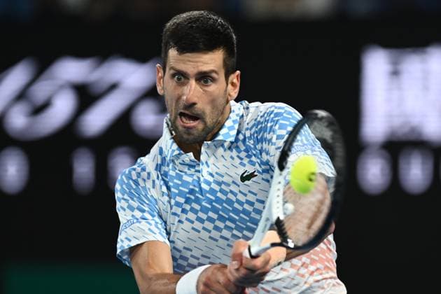 TENNIS AUSTRALIAN OPEN, Novak Djokovic of Serbia in action during the Men?s Singles Final against Stefanos Tsitsipas of Greece at the 2023 Australian Open tennis tournament at Melbourne Park in Melbourne, Sunday, January 29, 2023. ( NO ARCHIVING, EDITORIAL USE ONLY, NO USE IN BOOKS WITHOUT CONSENT MELBOURNE VICTORIA AUSTRALIA  Copyright: xJOELxCARRETTx 20230129001757884705