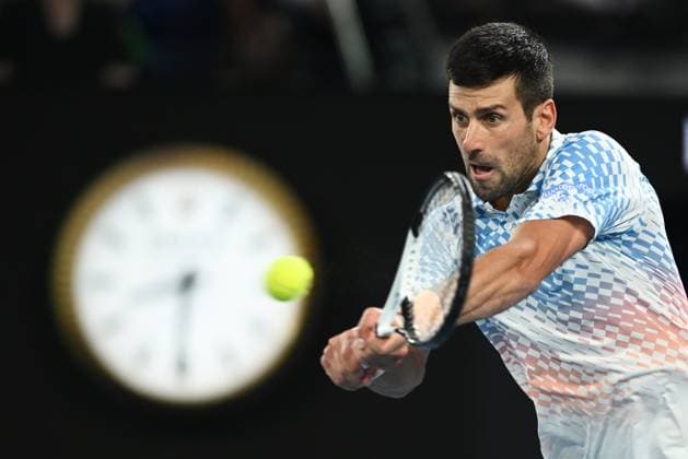 TENNIS AUSTRALIAN OPEN, Novak Djokovic of Serbia in action during the Men?s Singles Final against Stefanos Tsitsipas of Greece at the 2023 Australian Open tennis tournament at Melbourne Park in Melbourne, Sunday, January 29, 2023. ( NO ARCHIVING, EDITORIAL USE ONLY, NO USE IN BOOKS WITHOUT CONSENT MELBOURNE VICTORIA AUSTRALIA  Copyright: xJOELxCARRETTx 20230129001757886491