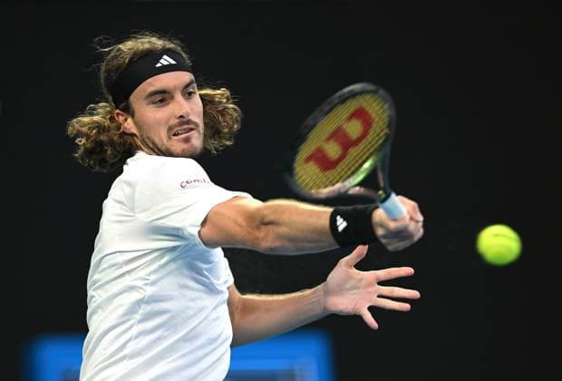 TENNIS AUSTRALIAN OPEN, Stefanos Tsitsipas of Greece returns to Novak Djokovic of Serbia during the men?s singles final at the 2023 Australian Open tennis championship at Melbourne Park in Melbourne, Sunday, January 29, 2023. ( NO ARCHIVING, EDITORIAL USE ONLY, NO USE IN BOOKS WITHOUT CONSENT MELBOURNE VICTORIA AUSTRALIA  Copyright: xJamesxRossx 20230129001757887457
