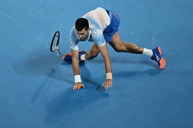TENNIS AUSTRALIAN OPEN, Novak Djokovic of Serbia stumbles during the Men?s Singles Final against Stefanos Tsitsipas of Greece at the 2023 Australian Open tennis tournament at Melbourne Park in Melbourne, Sunday, January 29, 2023. ( NO ARCHIVING, EDITORIAL USE ONLY, NO USE IN BOOKS WITHOUT CONSENT MELBOURNE VICTORIA AUSTRALIA  Copyright: xLUKASxCOCHx 20230129001757888854