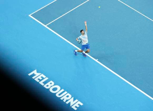 (230129) -- MELBOURNE, Jan. 29, 2023 -- Novak Djokovic of Serbia serves during the men s singles final match between Novak Djokovic of Serbia and Stefanos Tsitsipas of Greece at Australian Open tennis tournament, in Melbourne, Australia, Jan. 29, 2023. ) (SP)AUSTRALIA-MELBOURNE-TENNIS-AUSTRALIAN OPEN-MEN S SINGLES-FINAL BaixXuefei 