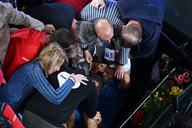 TENNIS AUSTRALIAN OPEN, An emotional Novak Djokovic of Serbia celebrates with his team in the players box following his win in the Men?s Singles Final against Stefanos Tsitsipas of Greece at the 2023 Australian Open tennis tournament at Melbourne Park in Melbourne, Sunday, January 29, 2023. ( NO ARCHIVING, EDITORIAL USE ONLY, NO USE IN BOOKS WITHOUT CONSENT MELBOURNE VICTORIA AUSTRALIA  Copyright: xLUKASxCOCHx 20230129001757911019