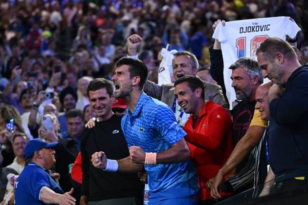 TENNIS AUSTRALIAN OPEN, An emotional Novak Djokovic of Serbia celebrates from his players box following his win in the Men?s Singles Final against Stefanos Tsitsipas of Greece at the 2023 Australian Open tennis tournament at Melbourne Park in Melbourne, Sunday, January 29, 2023. ( NO ARCHIVING, EDITORIAL USE ONLY, NO USE IN BOOKS WITHOUT CONSENT MELBOURNE VICTORIA AUSTRALIA  Copyright: xJOELxCARRETTx 20230129001757915599