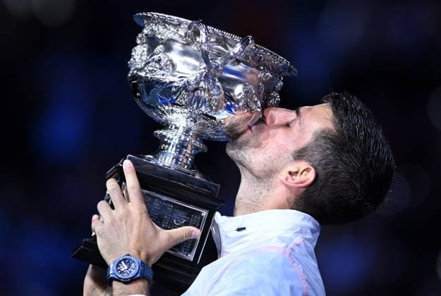 TENNIS AUSTRALIAN OPEN, Novak Djokovic of Serbia kisses the trophy after winning the men?s singles final against Stefanos Tsitsipas of Greece at the 2023 Australian Open tennis championship at Melbourne Park in Melbourne, Sunday, January 29, 2023. ( NO ARCHIVING, EDITORIAL USE ONLY, NO USE IN BOOKS WITHOUT CONSENT MELBOURNE VICTORIA AUSTRALIA  Copyright: xJamesxRossx 20230129001757922254