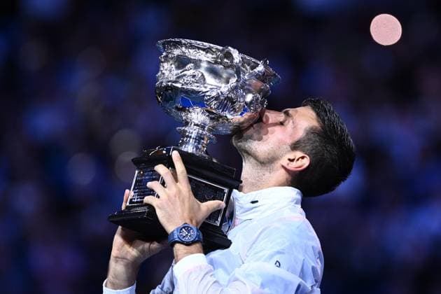 TENNIS AUSTRALIAN OPEN, Novak Djokovic of Serbia kisses the Norman Brooks Challenge Cup following his win in the Men?s Singles Final against Stefanos Tsitsipas of Greece at the 2023 Australian Open tennis tournament at Melbourne Park in Melbourne, Sunday, January 29, 2023. ( NO ARCHIVING, EDITORIAL USE ONLY, NO USE IN BOOKS WITHOUT CONSENT MELBOURNE VICTORIA AUSTRALIA  Copyright: xJOELxCARRETTx 20230129001757922441