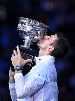 TENNIS AUSTRALIAN OPEN, Novak Djokovic of Serbia kisses the Norman Brooks Challenge Cup after winning the men?s singles final against Stefanos Tsitsipas of Greece at the 2023 Australian Open tennis championship at Melbourne Park in Melbourne, Sunday, January 29, 2023. ( NO ARCHIVING, EDITORIAL USE ONLY, NO USE IN BOOKS WITHOUT CONSENT MELBOURNE VICTORIA AUSTRALIA  Copyright: xJamesxRossx 20230129001757923019