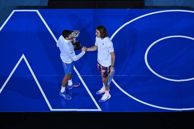 TENNIS AUSTRALIAN OPEN, Novak Djokovic of Serbia shakes hands with Stefanos Tsitsipas of Greece following the Men?s Singles Final at the 2023 Australian Open tennis tournament at Melbourne Park in Melbourne, Sunday, January 29, 2023. ( NO ARCHIVING, EDITORIAL USE ONLY, NO USE IN BOOKS WITHOUT CONSENT MELBOURNE VICTORIA AUSTRALIA  Copyright: xLUKASxCOCHx 20230129001757928043