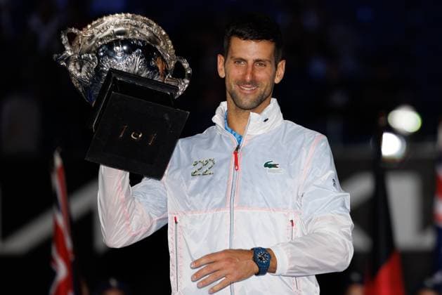 January 29, 2023: The MenÃ¢â‚¬â ¢s Singles Champion NOVAK DJOKOVIC of Serbia pose for photos with the trophy after defeating STEFANOS TSITSIPAS of Greece on Rod Laver Arena on day 14 of the 2023 Australian Open in Melbourne, Australia. Cal Media USA - ZUMAc04_ 20230129_zaf_c04_020 Copyright: xSydneyxLowx