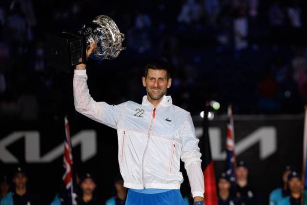 January 29, 2023: The MenÃ¢â‚¬â ¢s Singles Champion NOVAK DJOKOVIC of Serbia pose for photos with the trophy after defeating STEFANOS TSITSIPAS of Greece on Rod Laver Arena on day 14 of the 2023 Australian Open in Melbourne, Australia. Cal Media USA - ZUMAc04_ 20230129_zaf_c04_022 Copyright: xSydneyxLowx