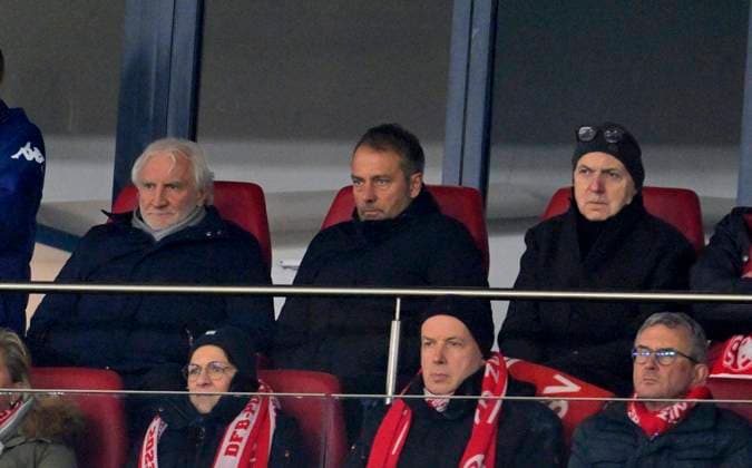 01 02 2023, Football DFB Cup 2022 2023, Round of 16, 1 FSV Mainz 05 FC Bayern Munich, at Mewa Arena Mainz Sports director Rudi Völler Germany , national coach Hansi Flick Germany and president Bernd Neuendorf Germany sit in the stands DFL and DFB regulations prohibit any use of photographs as image sequences and or quasi video