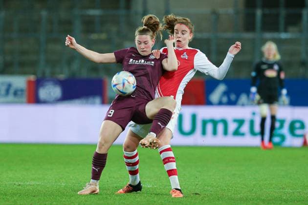 f l Ramona Maier SGS Essen, 9 and Myrthe Moorrees 1 FC Köln, 6 in duel, duel, dynamic, action, game scene, THE DFB REGULATIONS PROHIBIT ANY USE OF PHOTOGRAPHS AS IMAGE SEQUENCES AND OR QUASI VIDEO , 03 02 2023, Essen Germany , Football, Flyeralarm Womens Bundesliga, SGS Essen 1 FC Cologne xobx