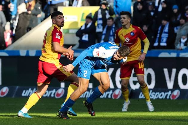 Cristiano Piccini 1 FC Magdeburg,2 vs Malik Batmaz Karlsruher SC,9 2 Football Bundesliga Season 2022 2023 1 FC Magdeburg vs Karlsruher SC at MDCC Arena in Magdeburg Action,Football,Man,Men,Germany,05 02 2023