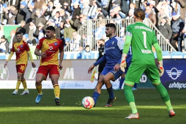 Cristiano Piccini 1 FC Magdeburg,2 and goalkeeper Dominik Reimann 1 FC Magdeburg,1 against Malik Batmaz Karlsruher SC,9 2 Football Bundesliga Season 2022 2023 1 FC Magdeburg vs Karlsruher SC in the MDCC Arena in Magdeburg Action,Football,Man,Men,Germany,05 02 2023
