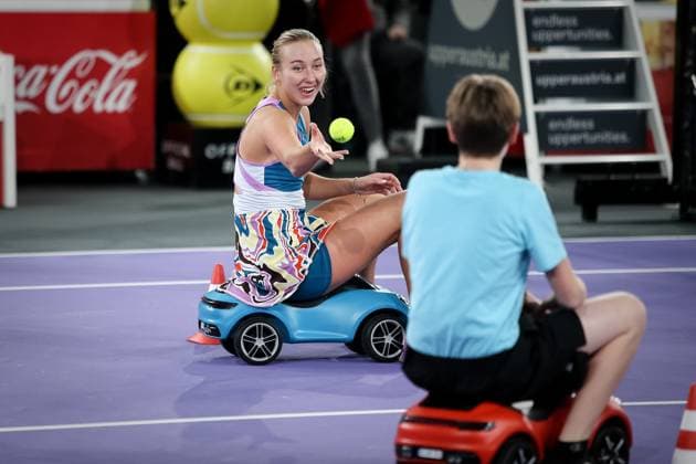 TENNIS - WTA, Tennis Damen Upper Austria Ladies Linz LINZ,AUSTRIA,11.FEB.23 - TENNIS - WTA Tour, Upper Austria Ladies Linz. Image shows Anastasia Potapova (RUS) with a bobby car at the center court.  GEPAxpictures xManfredxBinder