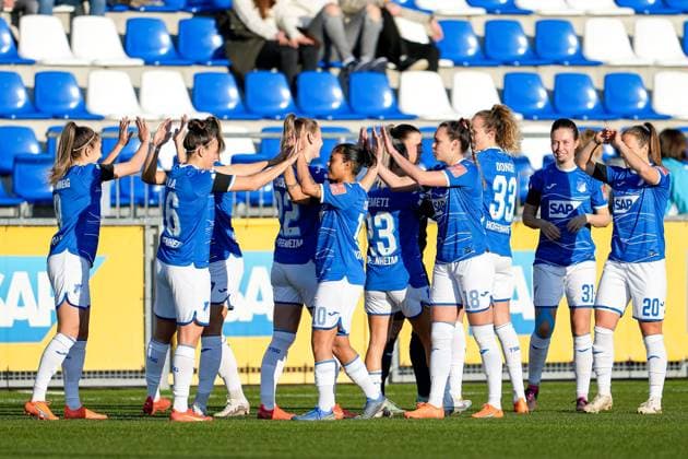 TSG 1899 Hoffenheim players, high-five each other before the match, motivate each other for the match, motivation, anticipation, confident, confident, action, action, 12 02 2023, Sinsheim Hoffenheim Germany , football, Flyeralarm Frauen Bundesliga, TSG 1899 Hoffenheim 1 FC Köln, 12 02 2023, Sinsheim Hoffenheim Germany , Football, Flyeralarm Frauen Bundesliga, TSG 1899 Hoffenheim 1 FC Köln, DFB DFL REGULATES PROHIBIT ANY USE OF PHOTOGRAPHS AS IMAGE SEQUENCES AND OR QUASI VIDEO xozx