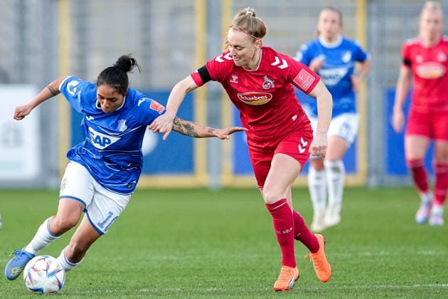 v li Gia Corley TSG, 10 , Sarah Puntigam Cologne, 17 , duel, game scene, duel, duel, tackle, tackling, dynamics, action, action, 12 02 2023, Sinsheim Hoffenheim Germany , Football, Flyeralarm Frauen Bundesliga, TSG 1899 Hoffenheim 1 FC Köln, 12 02 2023, Sinsheim Hoffenheim Germany , Football, Flyeralarm Frauen Bundesliga, TSG 1899 Hoffenheim 1 FC Köln, DFB DFL REGULATES PROHIBIT ANY USE OF PHOTOGRAPHS AS IMAGE SEQUENCES AND OR QUASI VIDEO xozx
