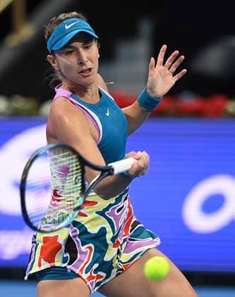 (230215) -- DOHA, Feb. 15, 2023 -- Belinda Bencic of Switzerland hits a return during the singles round of 32 match against Viktoriya Tomova of Bulgaria at WTA500 Qatar Open 2023 in Doha, Qatar, Feb. 14, 2023. (Photo by Xinhua) (SP)QATAR-DOHA-TENNIS WTA, Tennis Damen 500-DAY 2 Nikku 