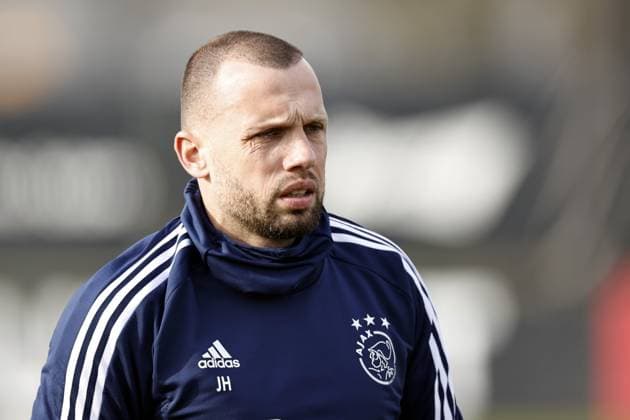 AMSTERDAM - Ajax coach John Heitinga during a training session prior to the UEFA Europa League play-off match between Ajax Amsterdam and FC Union Berlin at sportpark de Toekomst on February 15, 2023 in Amsterdam, Netherlands. ANP MAURICE VAN STONE UEFA Europa League Play-off MD-1 2022 2023 xVIxANPxSportx xxANPxIVx 462843485 originalFilename: 462843485.jpg