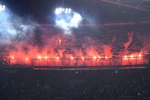 Soccer Europa League K o round Play off Ajax Amsterdam 1 FC Union Berlin on 16 02 2023 in the Johan Cruijff ArenA in Amsterdam Fans 1 FC Union Berlin ignite Bengalos pyro pyrotechnics flares smoke bombs in the fan block xRx