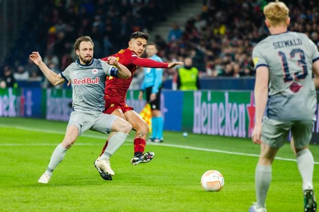 SOCCER - UEFA EL, RBS vs Roma SALZBURG,AUSTRIA,16.FEB.23 - SOCCER - UEFA Europa League, play off, Red Bull Salzburg vs AS Roma. Image shows Andreas Ulmer (RBS) and Paulo Dybala (Roma).  GEPAxpictures xGintarexKarpaviciute