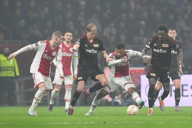 Football, men, season 2022 2023, Europa League Play Offs to the round of 16, first leg , Ajax Amsterdam 1 FC Union Berlin, f l Kenneth Taylor Ajax Amsterdam , Morten Thorsby 1 FC Union Berlin , Owen Wijndal Ajax Amsterdam and Sheraldo Becker 1 FC Union Berlin in duel , 16 02 2023, Copyright: xMatthiasxKochx