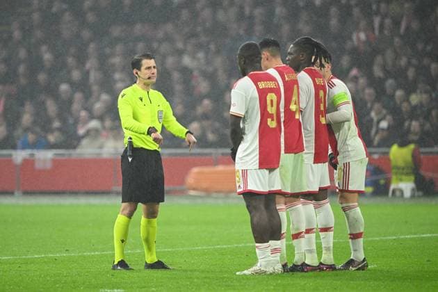 Football, Men, Season 2022 2023, Europa League Play Offs to the Round of 16, First leg , Ajax Amsterdam 1 FC Union Berlin, f l referee Halil Umut Meler, Brian Brobbey Ajax Amsterdam , Edson Alvarez Ajax Amsterdam , Calvin Bassey Ajax Amsterdam and Dusan Tadic Ajax Amsterdam , 16 02 2023, Copyright: xMatthiasxKochx