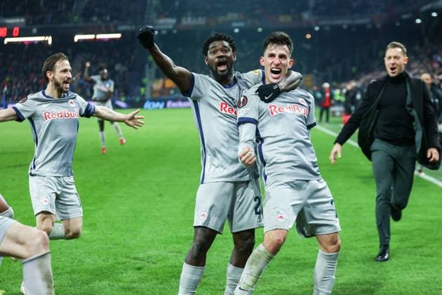 SOCCER - UEFA EL, RBS vs Roma SALZBURG,AUSTRIA,16.FEB.23 - SOCCER - UEFA Europa League, play off, Red Bull Salzburg vs AS Roma. Image shows the rejoicing of Andreas Ulmer, Sekou Koita and Nicolas Capaldo (RBS).  GEPAxpictures xDavidxGeieregger