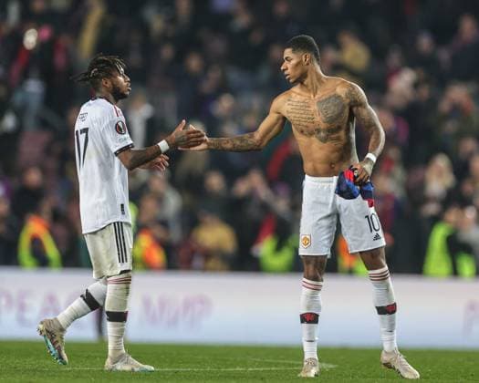 UEFA Europa League Knockout Round Play-Offs Barcelona v Manchester United, ManU Fred 17 of Manchester United shakes hands with Marcus Rashford 10 of Manchester United during the UEFA Europa League Knockout Round Play-Offs Barcelona vs Manchester United at Spotify Camp Nou, Barcelona, Spain, 16th February 2023 (Photo by Mark Cosgrove News Images) Barcelona Camp Nou Catalonia Spain Copyright: xMarkxCosgrove NewsxImagesx