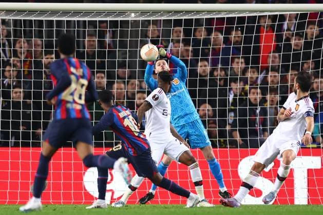 Mandatory Credit: Photo by Simon Dael Shutterstock (13765759bi) David De Gea of Manchester United, ManU makes a save from the shot of Ansu Fati of Barcelona Barcelona v Manchester United, UEFA Europa League, Play-Off Round, First Leg, Football, Camp Nou, Barcelona, Spain - 16 Feb 2023 EDITORIAL USE ONLY No use with unauthorised audio, video, data, fixture lists, club league logos or live services. Online in-match use limited to 120 images, no video emulation. No use in betting, games or single club league player publications. Barcelona v Manchester United, UEFA Europa League, Play-Off Round, First Leg, Football, Camp Nou, Barcelona, Spain - 16 Feb 2023 EDITORIAL USE ONLY No use with unauthorised audio, video, data, fixture lists, club league logos or live services. Online in-match use limited to 120 images, no video emulation. No use in betting, games or single club league player publications. Copyright: xSimonxDael Shutterstockx 13765759bi