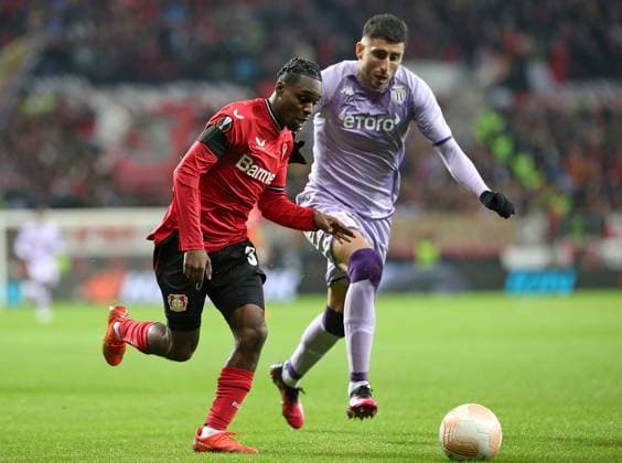 16 02 2023, Football UEFA Europa League 2022 2023, K o Runden Play off, Bayer 04 Leverkusen AS Monaco, at BayArena Leverkusen L R Jeremie Frimpong Bayer Leverkusen vs Guillermo Maripan AS Monaco DFL and DFB regulations prohibit any use of photographs as image sequences and or quasi video