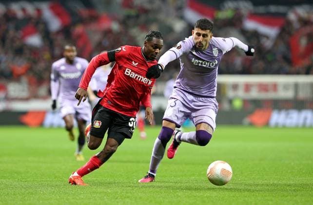 16 02 2023, Football UEFA Europa League 2022 2023, K o Runden Play off, Bayer 04 Leverkusen AS Monaco, at BayArena Leverkusen L R Jeremie Frimpong Bayer Leverkusen vs Guillermo Maripan AS Monaco DFL and DFB regulations prohibit any use of photographs as image sequences and or quasi video