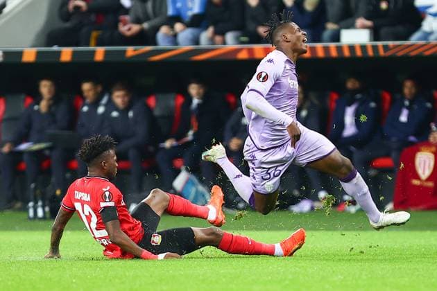 Yellow card for Edmond Tapsoba Bayer 04 Leverkusen for foul on Breel Embolo AS Monaco Bayer 04 Leverkusen vs AS Monaco, football, UEFA Europa League, knockout round play off first leg, 2022 2023 season, 16 02 2023 Leverkusen Nordrhein Westfalen Germany Copyright: xkolbert-press AntxPalmerx