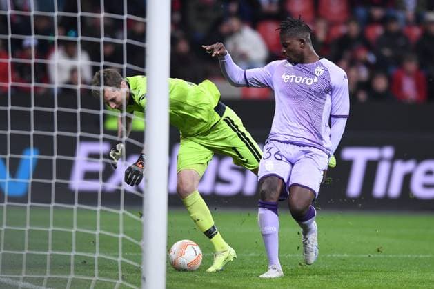 Soccer Europa League K o round Play off Bayer 04 Leverkusen AS Monaco on 16 02 2023 in the BayArena in Leverkusen goal shot goal to 0 1 by own goal Lukas Hradecky Leverkusen Lukas Hradecky Leverkusen , left Breel Embolo Monaco , right xHDx