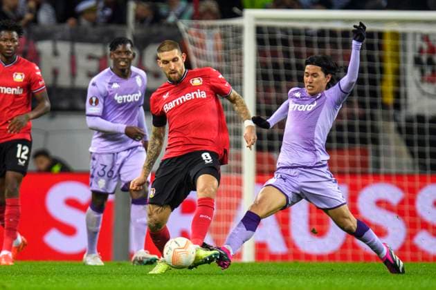 Soccer Champions League, 2022 2023 season, round of 16, Bayer 04 Leverkusen AS Monaco on 16 02 2023 in Leverkusen North Rhine Westphalia Leverkusen s Robert Andrich in a duel with Monaco™s Takumi Minamino Copyright: xKirchnerx xChristopherxNeundorfx