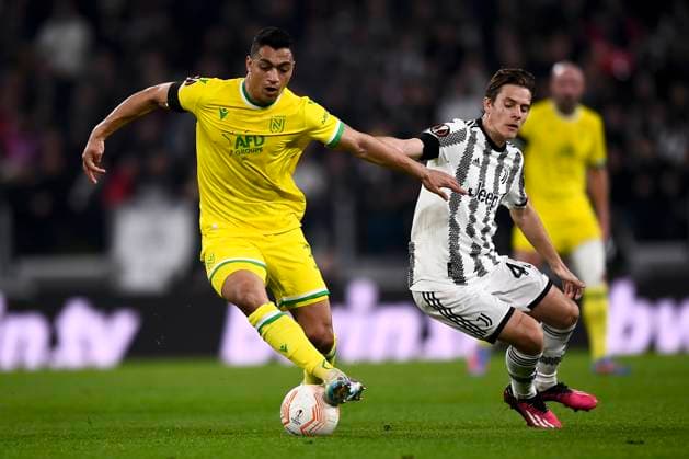 Juventus FC v FC Nantes - UEFA Europa League Mostafa Mohamed of FC Nantes competes for the ball with Nicolo Fagioli of Juventus FC during the UEFA Europa League knockout round play-off leg one football match between Juventus FC and FC Nantes. Turin Italy Copyright: xNicolòxCampox