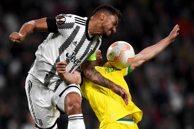 Juventus FC v FC Nantes - UEFA Europa League Danilo Luiz da Silva of Juventus FC competes for a header with Mostafa Mohamed of FC Nantes during the UEFA Europa League knockout round play-off leg one football match between Juventus FC and FC Nantes. Turin Italy Copyright: xNicolòxCampox