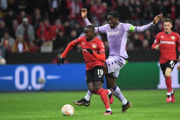 Soccer Europa League K o round Play off Bayer 04 Leverkusen AS Monaco on 16 02 2023 in the BayArena in Leverkusen Moussa Diaby Leverkusen , left Axel Disasi Monaco , right goal shot goal to 1 1 by Moussa Diaby Leverkusen xHDx