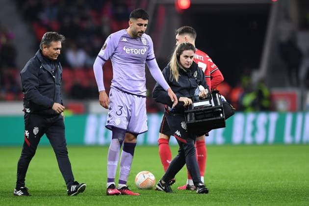 Soccer Europa League knockout round play off Bayer 04 Leverkusen AS Monaco on 16 02 2023 at the BayArena in Leverkusen Guillermo Maripan Monaco leaves the field injured injury xHDx