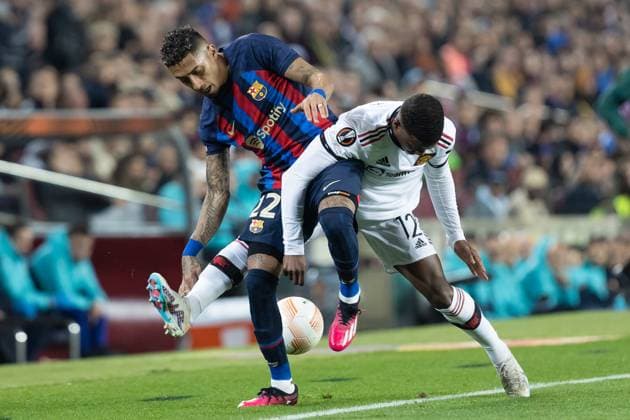 February 16, 2023, Barcelona, Spain: Raphinha of FC Barcelona, Barca in action with Tyrell Malacia of Manchester United, ManU during the UEFA Europa League knockout round play-off leg one match between FC Barcelona and Manchester United at Spotify Camp Nou in Barcelona, Spain. Barcelona Spain - ZUMAd159 20230216_zia_d159_013 Copyright: xGerardxFrancox