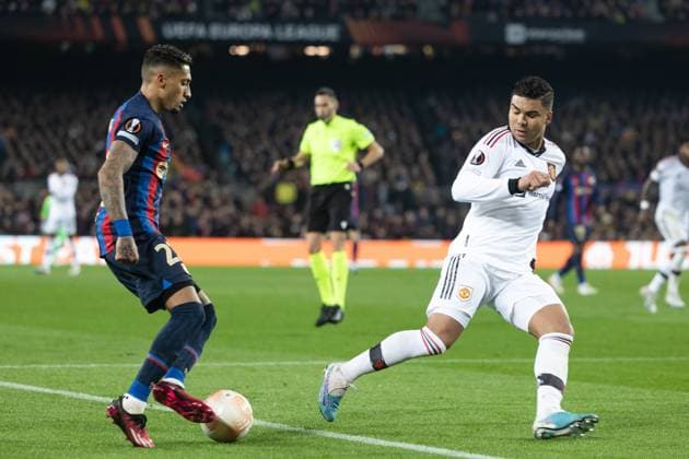 February 16, 2023, Barcelona, Spain: Raphinha of FC Barcelona, Barca in action with Casemiro of Manchester United, ManU during the UEFA Europa League knockout round play-off leg one match between FC Barcelona and Manchester United at Spotify Camp Nou in Barcelona, Spain. Barcelona Spain - ZUMAd159 20230216_zia_d159_034 Copyright: xGerardxFrancox