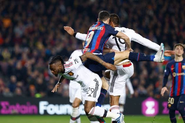 February 16, 2023, BARCELONA, BARCELONA, SPAIN: Robert Lewandowski of FC Barcelona, Barca and Aaron Wan-Bissaka of Manchester United, ManU in action during the UEFA Europa League, knockout round play-off, football match played between FC Barcelona and Manchester United at Spotify Camp Nou stadium on February 16, 2023, in Barcelona, Spain. BARCELONA SPAIN - ZUMAa181 20230216_zaa_a181_150 Copyright: xOscarxJ.xBarrosox